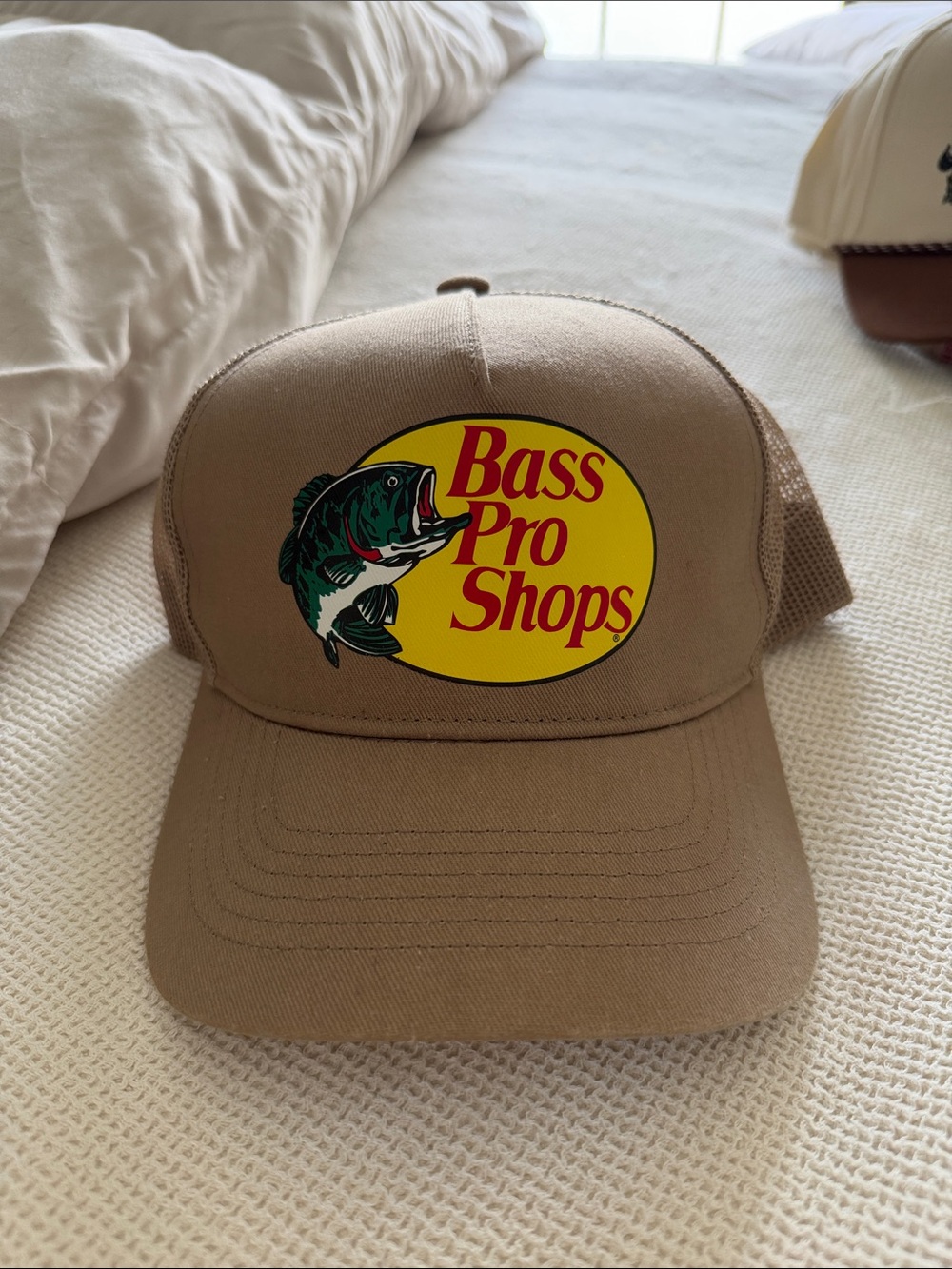 Bass Pro Shops Tan Trucker Hat with Yellow Logo and Green Fish